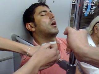 funny in the subway over a sleeping comrade :d