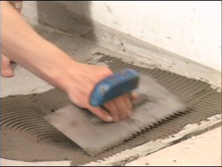 laying ceramic tiles on the floor, walls, grouting.