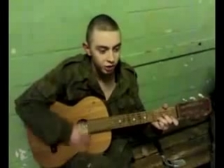 a soldier sings a song to mom home with a guitar
